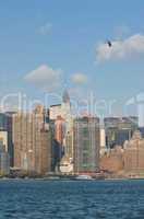 panorama of manhattan with flying helicopter
