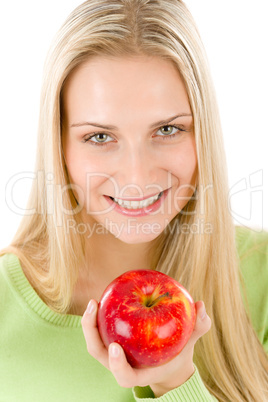 Healthy lifestyle - woman holding red apple