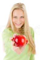 Healthy lifestyle - woman holding red apple