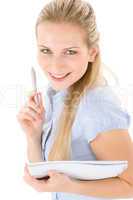 Happy student woman write notes on white background