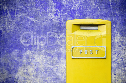 yellow mail-box over grunge background