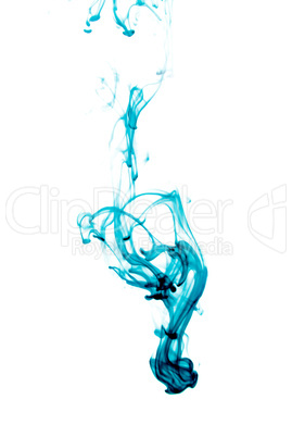 Blue ink splash flowing in water