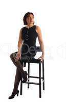 Mature woman sit on chair - look at light