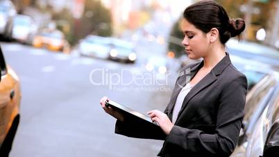 Young Businesswoman Using Wireless Tablet