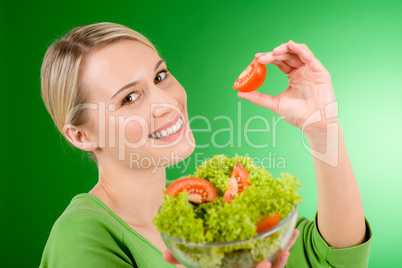 Healthy lifestyle - woman holding vegetable salad