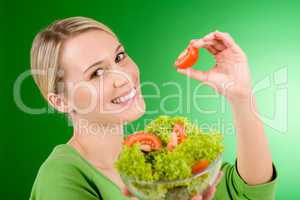 Healthy lifestyle - woman holding vegetable salad