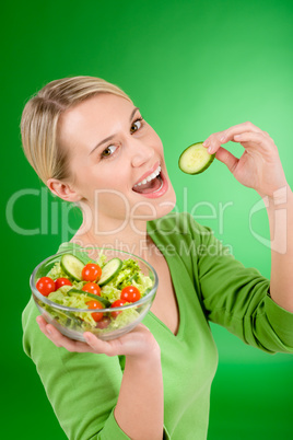 Healthy lifestyle - woman holding vegetable salad