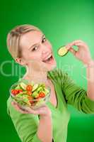 Healthy lifestyle - woman holding vegetable salad