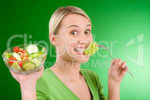 Healthy lifestyle - woman holding vegetable salad