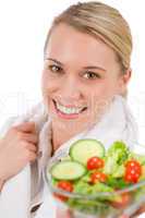Healthy lifestyle - smiling woman with vegetable salad
