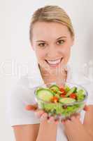 Healthy lifestyle - smiling woman with vegetable salad