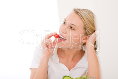 Healthy lifestyle - smiling woman with vegetable salad