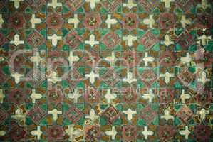 Tiled background with oriental ornaments .