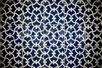 Tiled background with oriental ornaments .