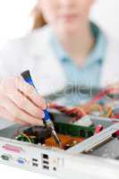 Female support computer engineer - woman repair