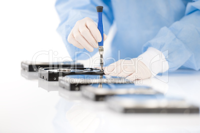 Computer engineer repair hard disc defect, sterile