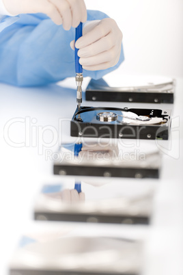 Computer engineer repair hard disc defect, sterile