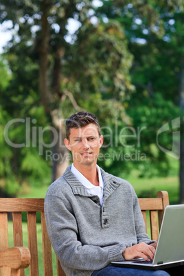 Concentrated man working on his laptop