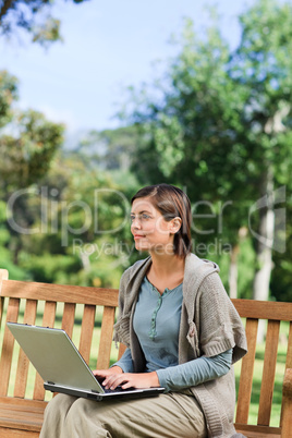 Young woman working on her laptop