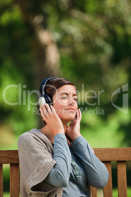 Young woman listening to some music