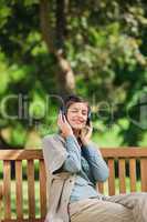 Young woman listening to some music