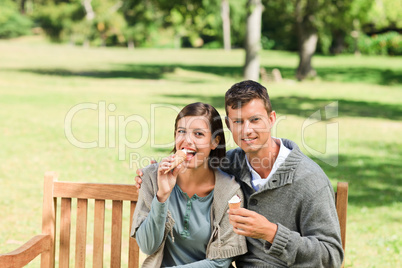 Young couple eating an ice cream