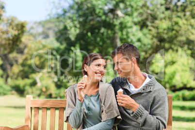 Young couple eating an ice cream