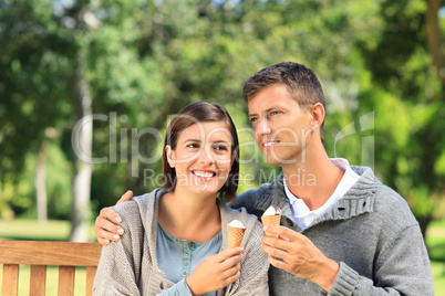 Young couple eating an ice cream