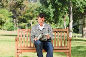 Man making his crossword