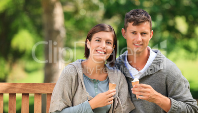 Young couple eating an ice cream