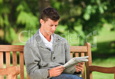 Man making his crossword