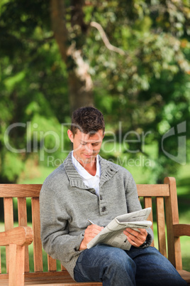 Man making his crossword