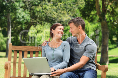 Couple working on their laptop