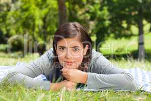 Woman lying down in the park