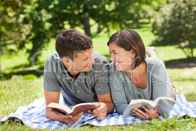 Couple reading a book