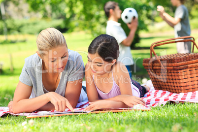 Happy family picnicking in the park