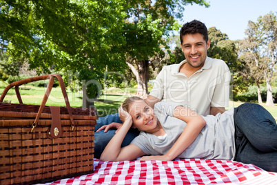 Lovers picnicking in the park