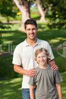 Son and his father in the park