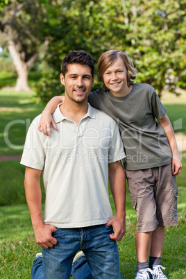 Son and his father in the park