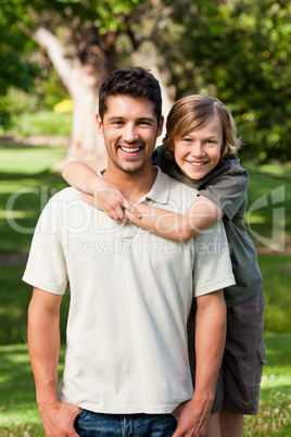 Father and his son in the park