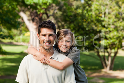 Father and his son in the park