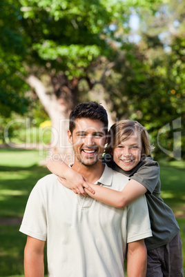 Father and his son in the park