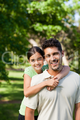 Daughter with her father in the park