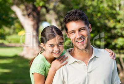 Daughter with her father in the park