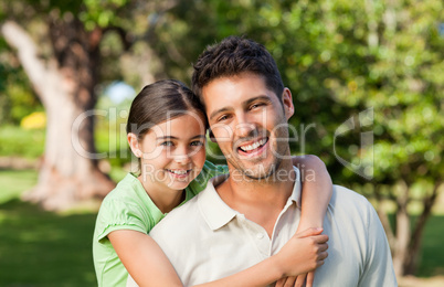 Daughter with her father in the park