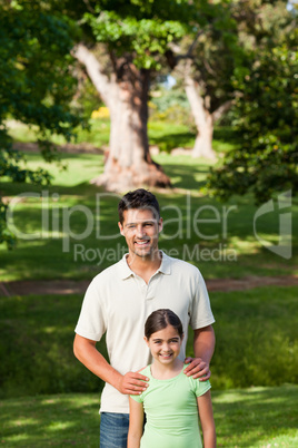 Daughter with her father in the park