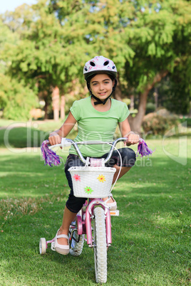 Little girl with her bike