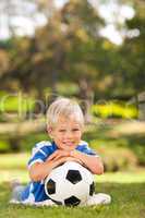 Boy with his ball in the park