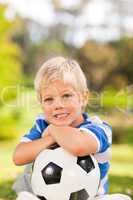 Boy with his ball in the park