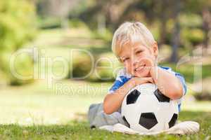 Boy with his ball in the park